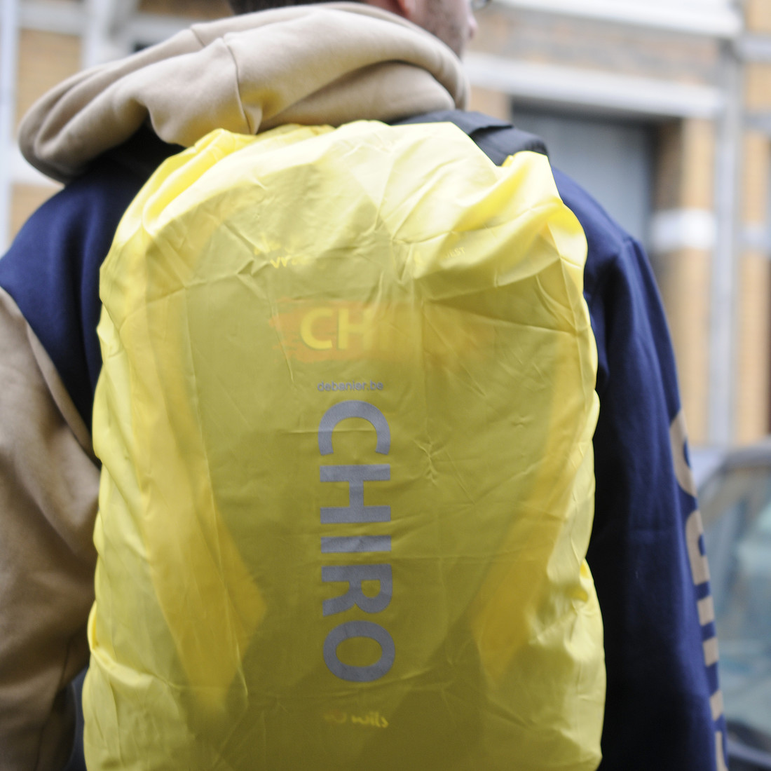 Regenhoes rugzak Chiro geel