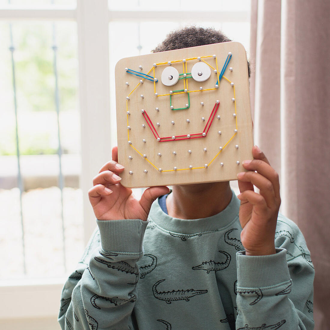 Geoboard met rekkertjes 4+