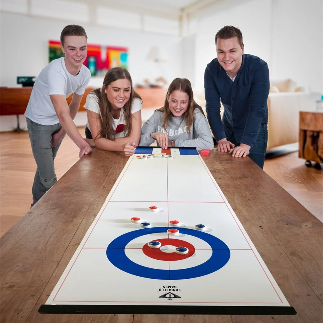 Curling- en sjoelspel met 16 pucks Curling- en sjoelspel met 16 pucks